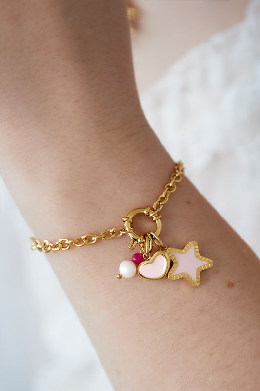 Pretty in pink bracelet with playful charms