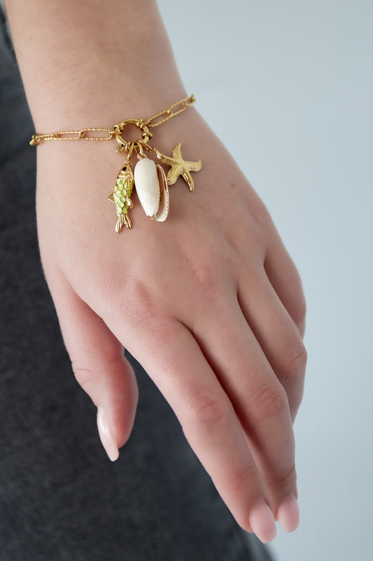 Golden beach vibes bracelet with sea-themed charms