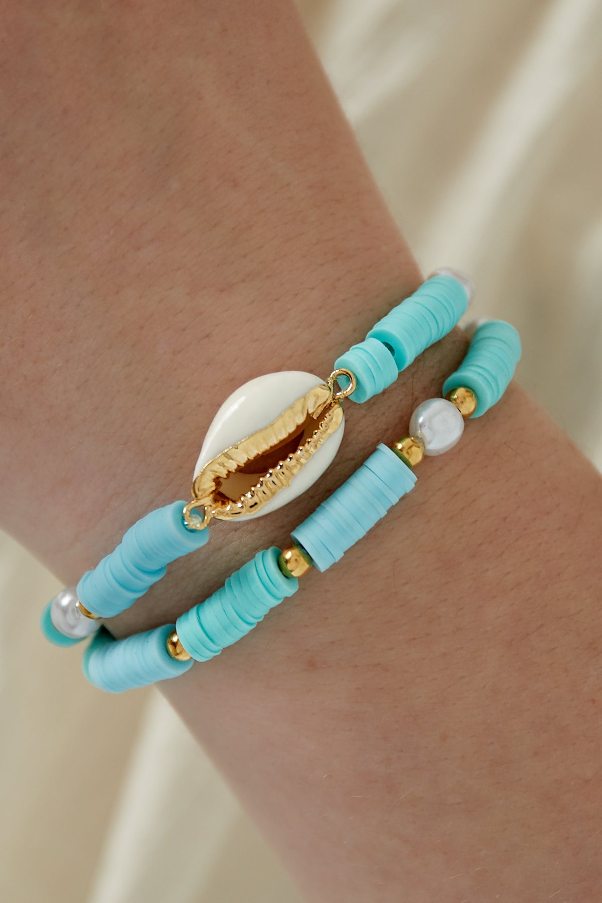 Double-layered cowrie shell bracelet