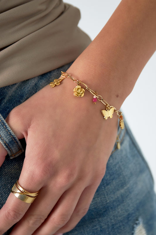 Golden garden bracelet with blooming charms