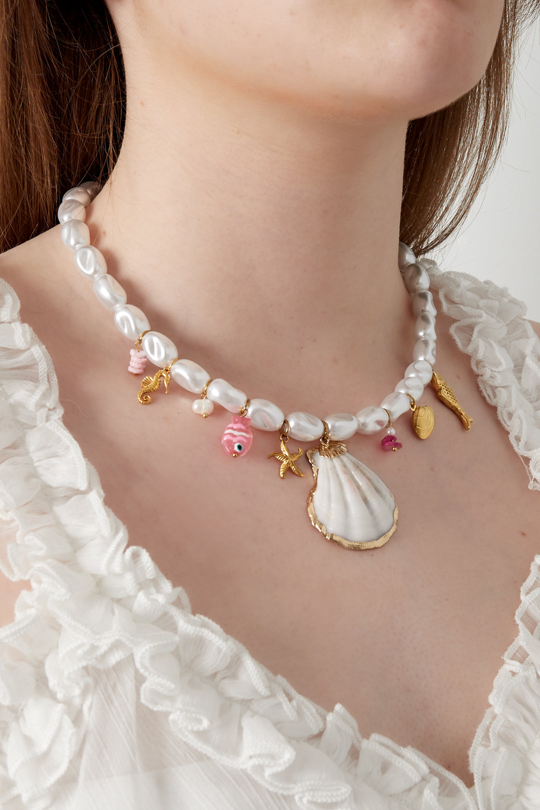 Necklace with pearls and sea charms