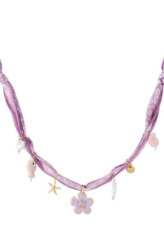Playful charm necklace with flowers and shells